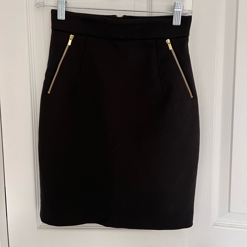 Black with gold zipper H&M skirt. Size 4